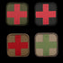 The Condor Medic Patch set includes four square patches for EDC: three display red crosses on green or tan, and one shows a green cross on tan/brown—ideal for First Responders and Law Enforcement professionals.